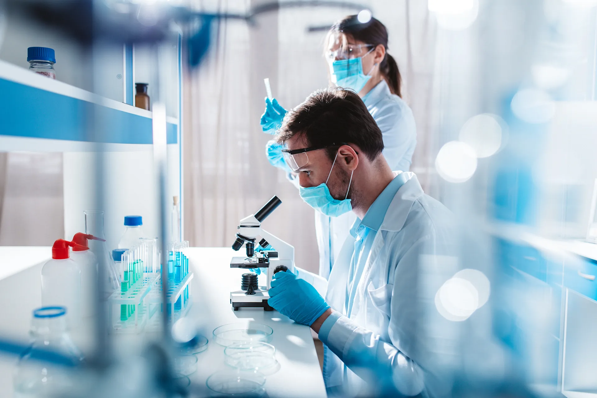 side view persons in a lab